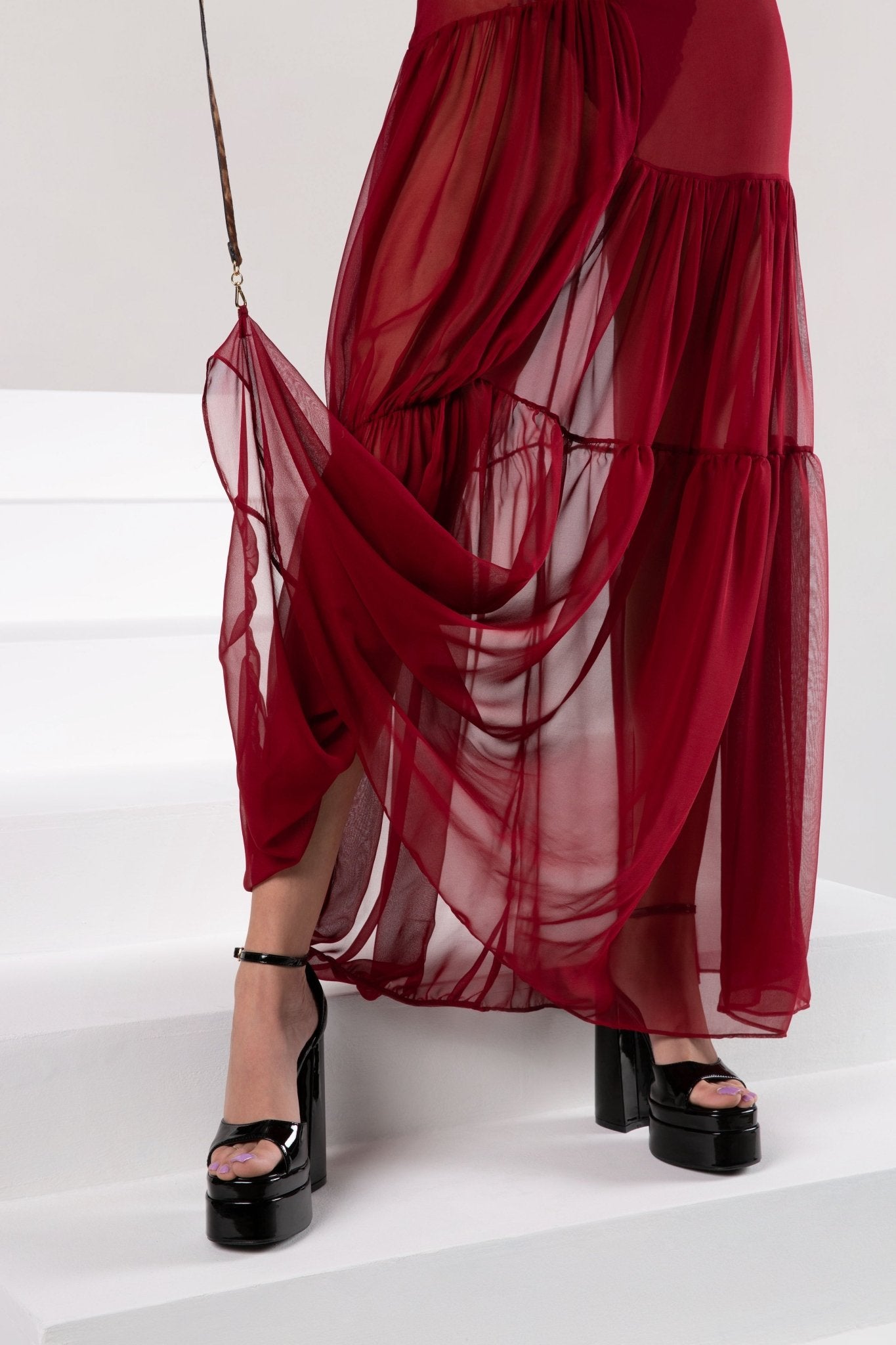 red revenge dress History repeats itself: Meghan Markle's revenge dress